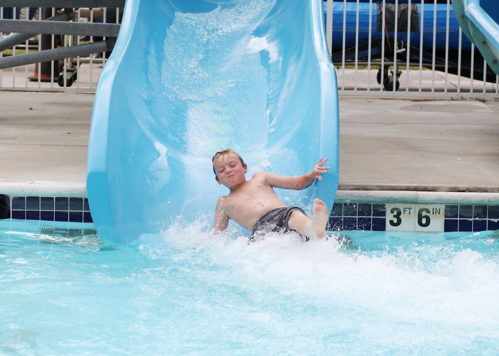 kid on water slide